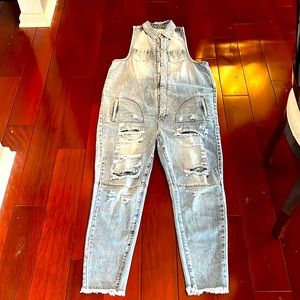 Ripped denim sleeveless jumpsuit! Fun, comfortable denim wear! Size: Medium.